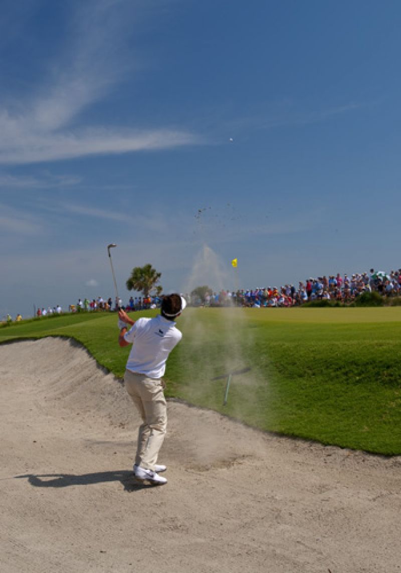 Gonzalo Fernandez-Castano hitting a great bunker shot on number 8.