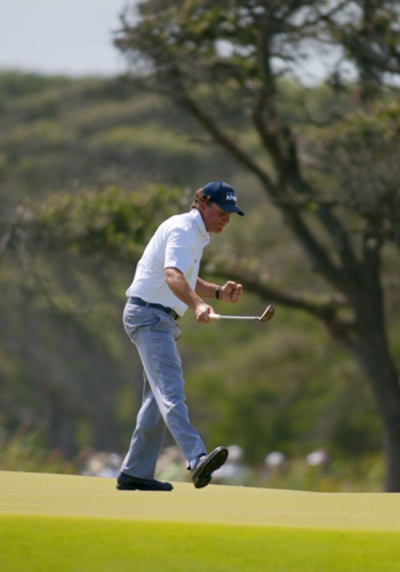 Phil Mickelson celebrates after birdieing the par 3 8th.