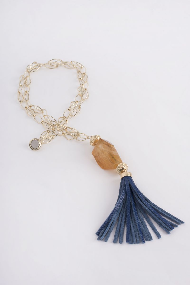 Clara Williams 14K yellow gold plated &quot;Willow&quot; necklace with large faceted Citrine centerpiece and Royal blue pebble grain leather tassel, $1,885 at Croghan&#039;s Jewel Box