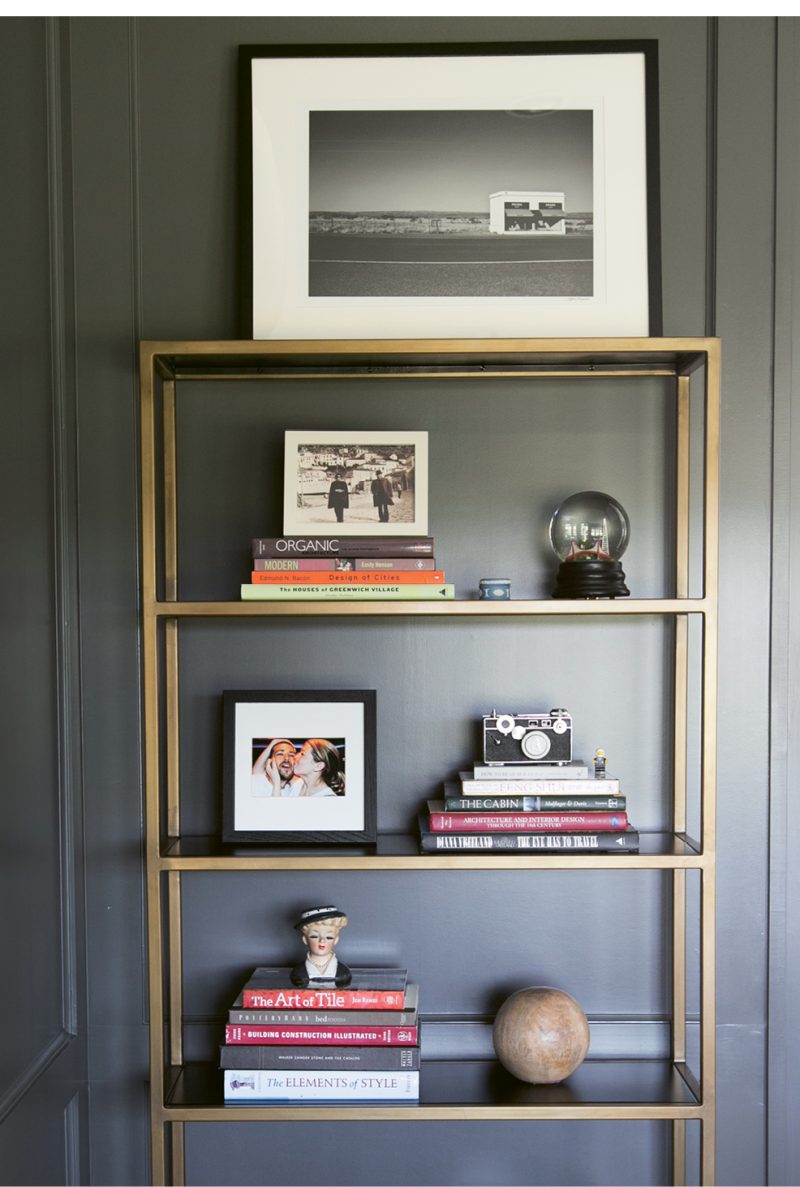 In Melissa’s office, gilded shelves display meaningful mementos, such as vintage cameras and Lego figurines that once belonged to her late brother.