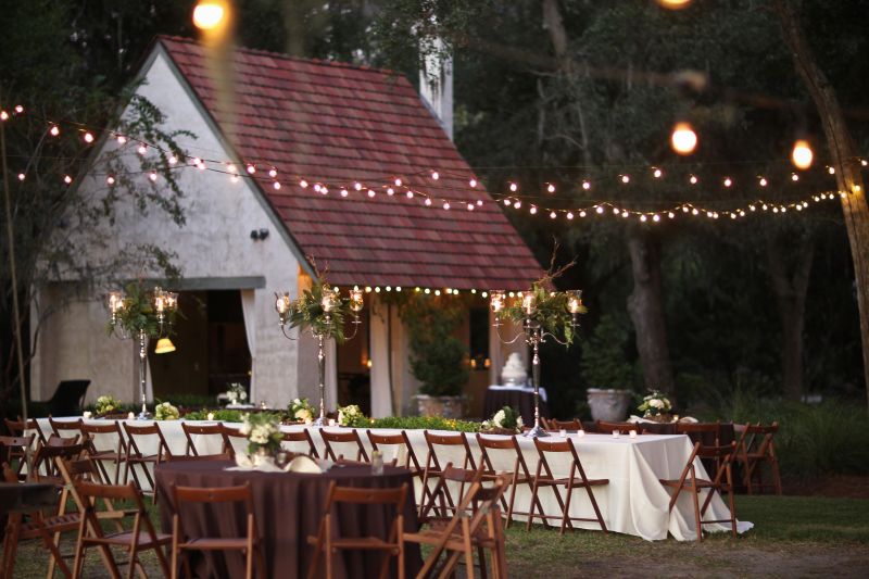 LET THERE BE LIGHT: When the sun set, candles and cross-crossed strings of bulb lights brightened the backyard.