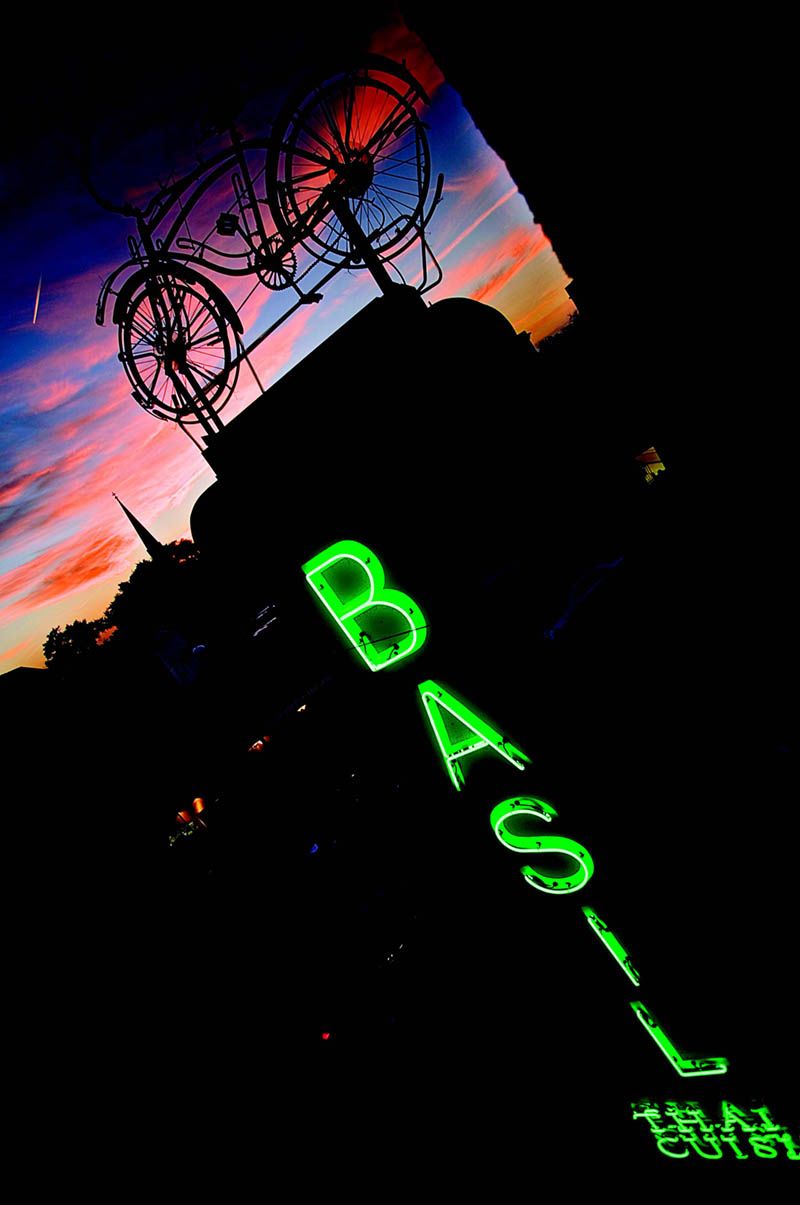 The bike from the former Robinson’s Toy Store, now above the Basil Thai Cuisine sign at King and Ann streets