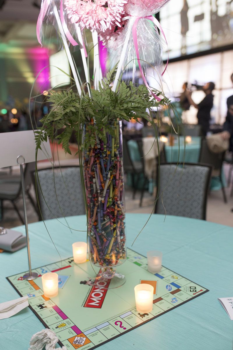 All table centerpieces were focused around the event&#039;s theme, A Kid At Heart.