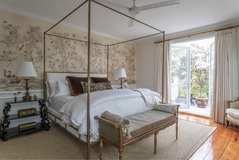 Working with a neutral palette, Alexandra created a peaceful oasis in the new primary suite. The custom Gracie wallpaper she designed adds a punch of drama without detracting from the serene atmosphere.