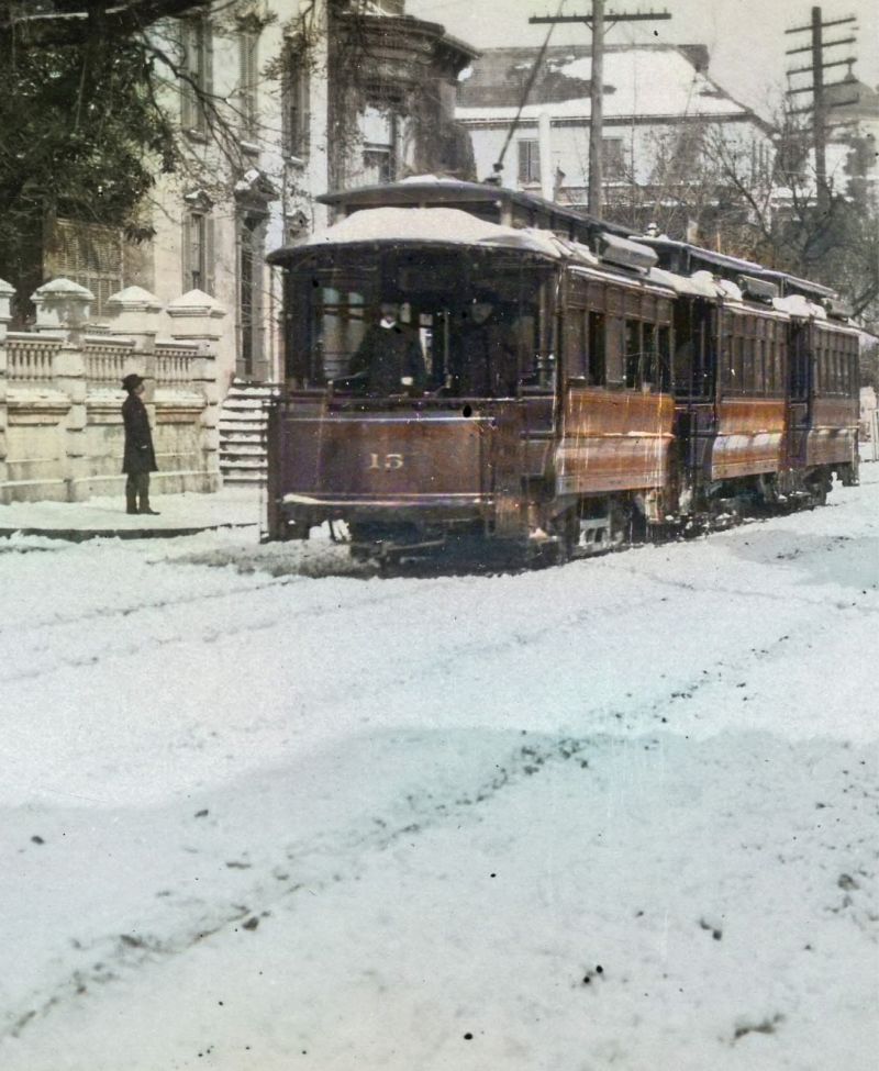 Snow Covered Tracks, undated, by Morton Brailsford Paine (1883-1940) A trolley car makes its way past the William Bull House at the corner of Meeting and Ladson streets.