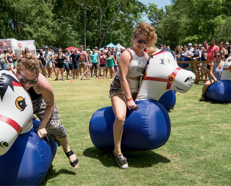 Festivalgoers got competitive during  the hilarious pony hop race.