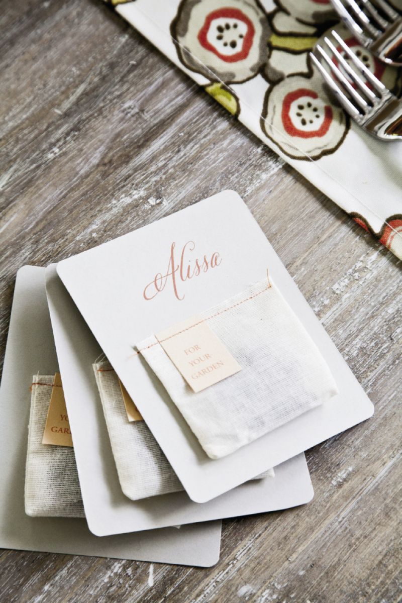 NAME GAME: Place cards doubled as favors when herb bags were filled with flower seeds and sewn onto the card stock with a note reading “for your garden”.