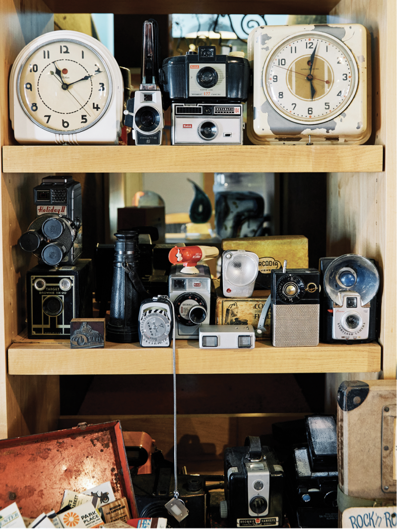 EBay finds, such as vintage alarm clocks and matchbooks displayed around the studio, fuel his inspiration.