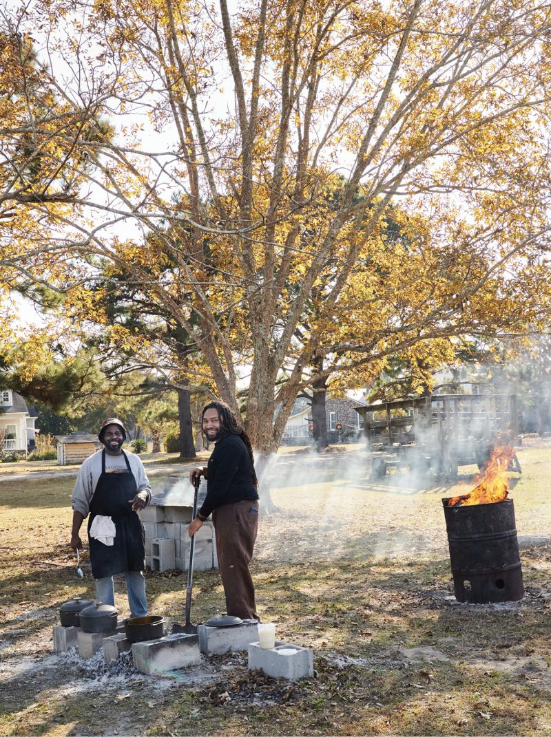 Dennis and Marvin Ross of Peculiar Pig Farm in Dorchester tend the fires. Dennis occasionally hosts live-fire cooking suppers on the property, including a sold-out event for Charleston Wine + Food next month.