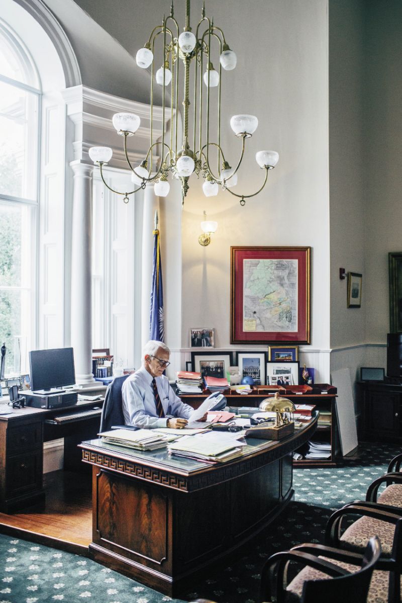 Mayor Riley holds forth from his memento-filled office at historic City Hall. Though his is decidedly not a desk job, Riley takes time from ribbon cuttings and meetings to attend to paperwork. Here the mayor, whose national prominence has risen over his tenure, signs two letters: one to President Obama and one to former New York Mayor Michael Bloomberg.