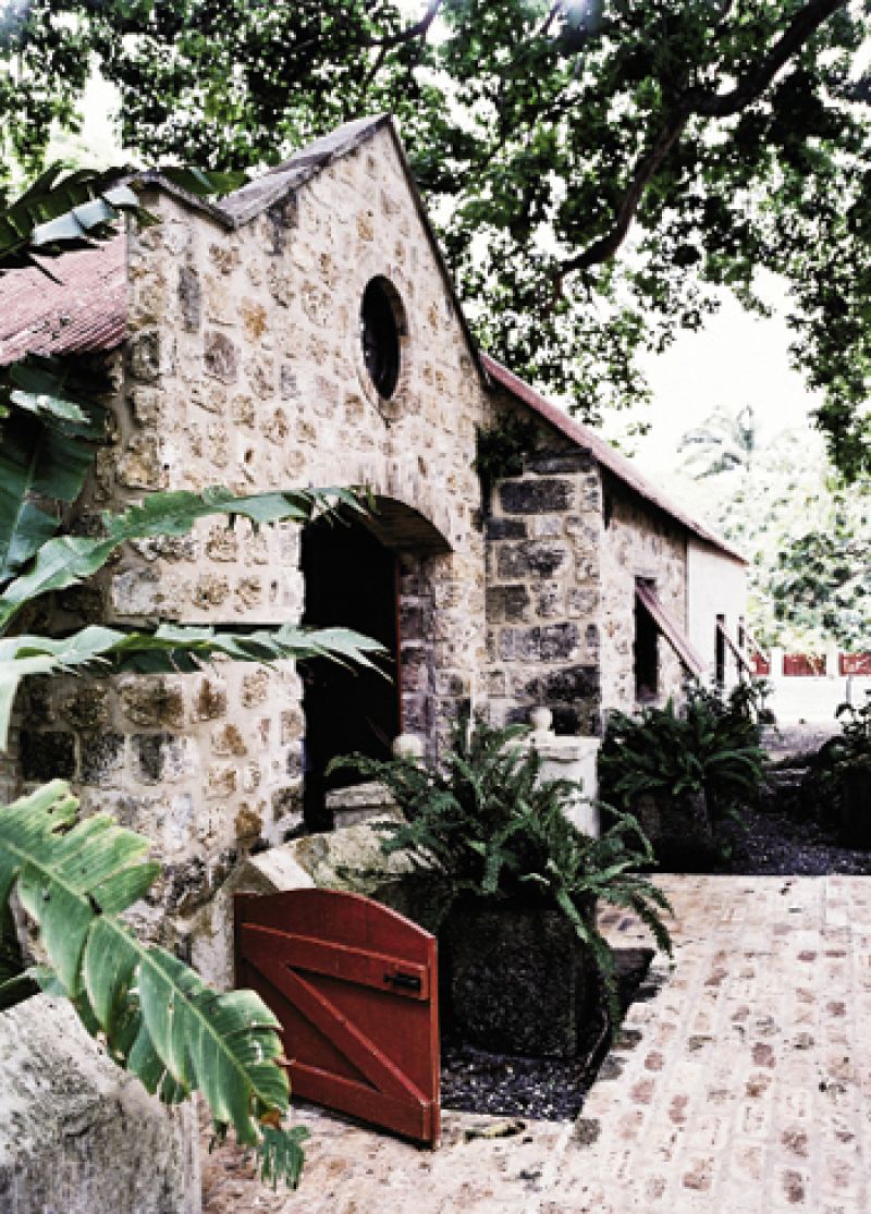 The great house (far left) is a mansion of Jacobean architecture; and the house, grounds, and rum tasting room are open for tours.