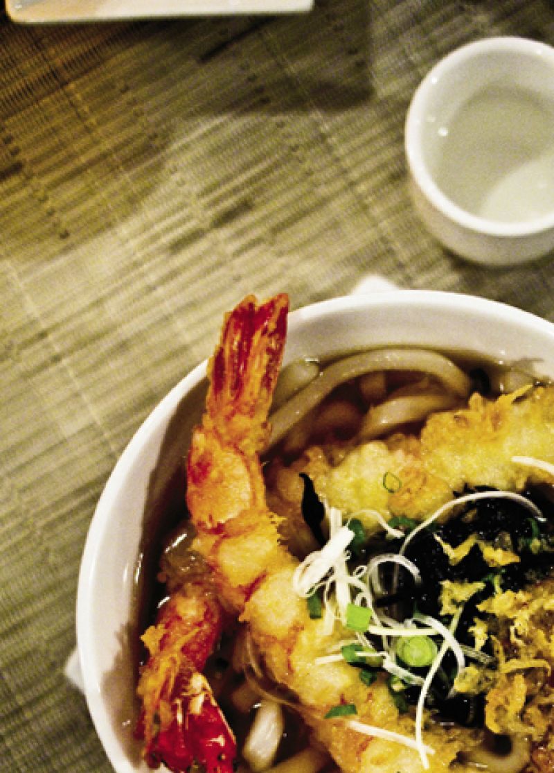 Whole fried snapper and a Banks beer at the Waterfront Café (top), where you can sit near bobbing sportfishing boats and the namesake bridge of Bridgetown.