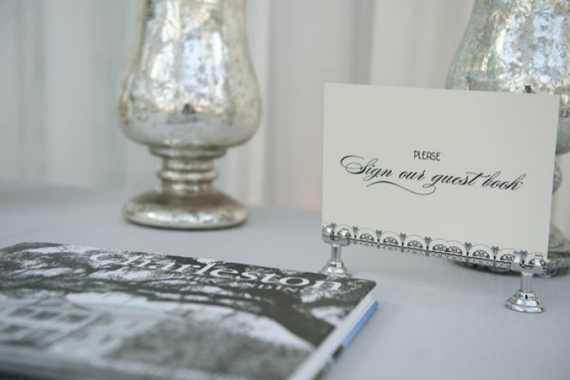 PAST &amp;  PRESENT: Guests signed a copy of Charleston Then and Now by W. Chris Phelps.