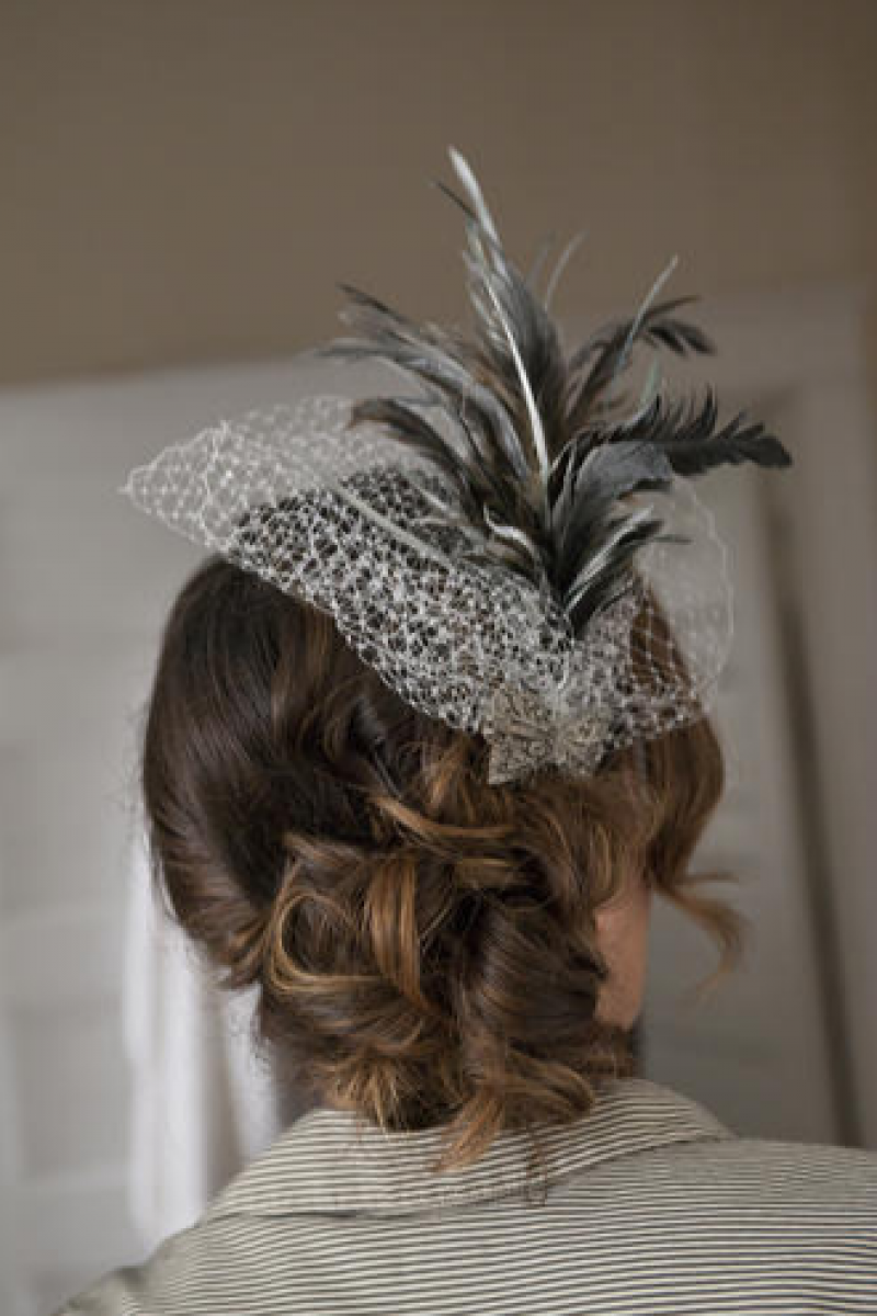 (HEAD)DRESSED TO IMPRESS: The bride’s mother and sister both donned vintage fascinators.