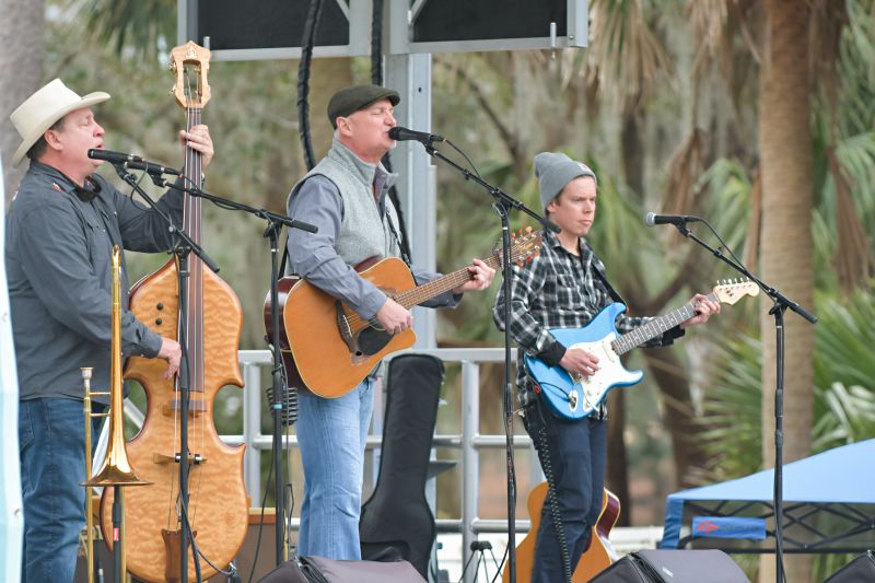 Hank Futch, Bobby Houck, and Dan Hood perform on the festival’s main stage.