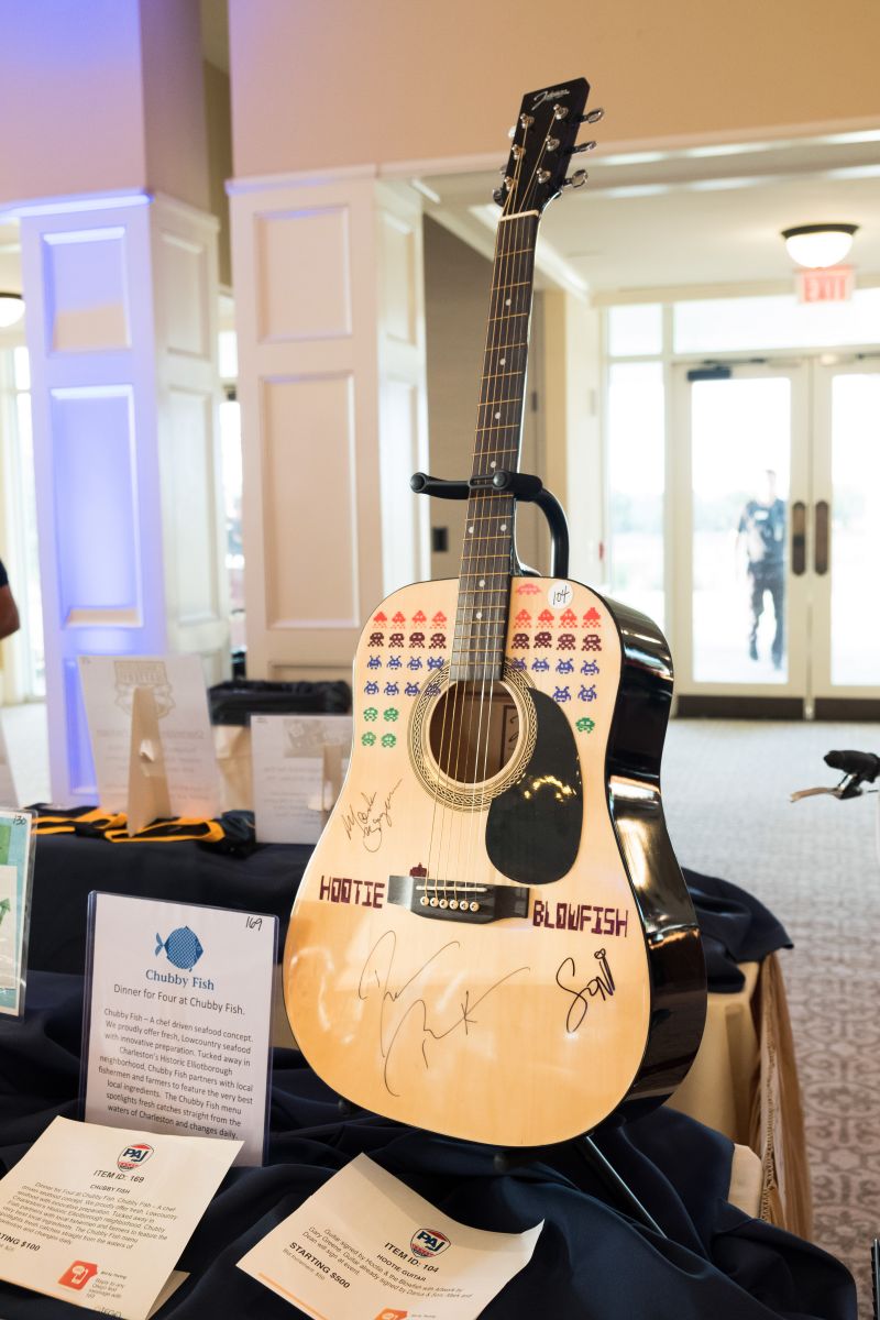 One of the silent auction items: a guitar signed by the members of Hootie and the Blowfish