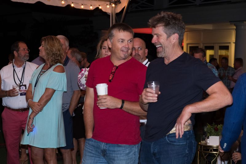 Musician Edwin McCain chats with a friend before the concert.