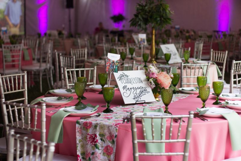 Each table featured a vibrant bouquet of florals and custom hand-lettering.