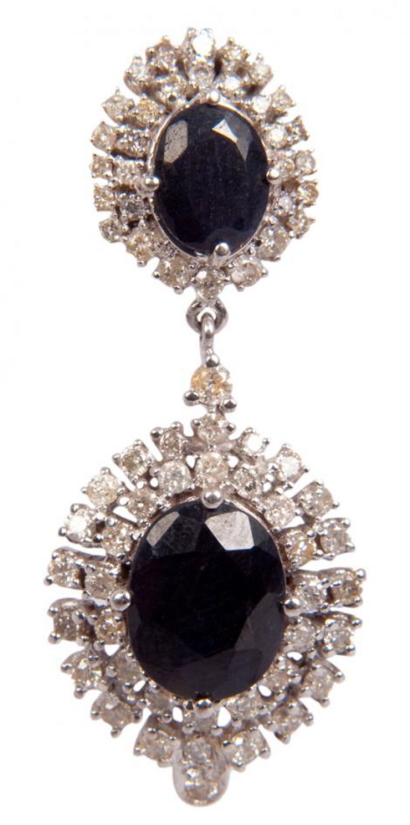 White gold and blue sapphire drop earrings with diamond accents, $3,000 at Swoon; photograph by Sophia Parker