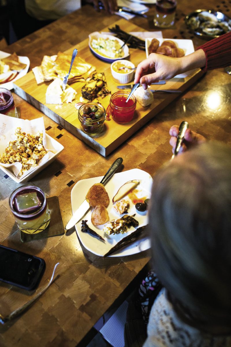 The Gin Joint chef Kayla Bennett arranged a menu of passed platters, including artisanal cheeses and pork sandwiches on pretzel buns, as well as the bar’s crave-worthy house-made beef jerky and pad thai popcorn. For recipes, visit charlestonmag.com/LeadingLadies.