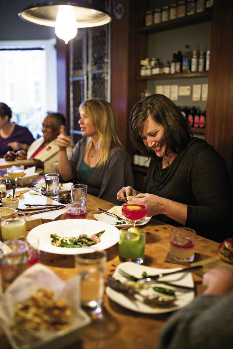 “Martha Lou was a quiet force at that table,” says Karalee Nielsen Fallert (center), owner of The Park Café and Lee Lee’s Hot Kitchen, of her enterprising neighbor who opened Martha Lou’s Kitchen on Morrison Drive in the 1980s. “When she spoke, everyone listened. Her stories about old restaurants north of the Crosstown were fascinating.”