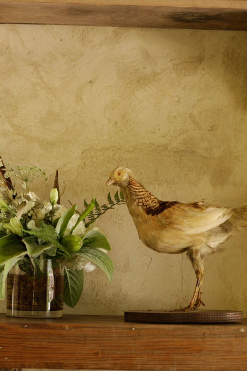 Another sweet vignette in the loggia. Florals by Jennigray Hewitt of RiverOaks.