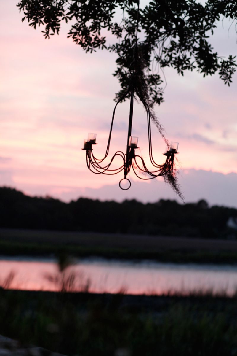 Marianne hung a chandlier from an oak that stretches over the dock at RiverOaks and it&#039;s since become the venue&#039;s signature icon.