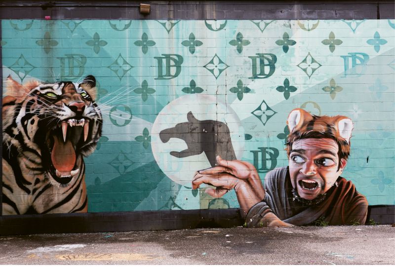 Untitled by Douglas Panzone behind Cha Cha’s Mexican Grill &amp; Rogue Motion (1409-1411 Folly Rd.)  about a decade ago, Panzone got permission to practice his large scale works behind this strip mall. Today, the back wall is a destination in and of itself for this outdoor “gallery.”