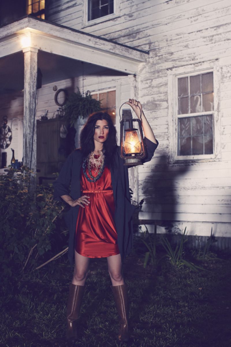 Lanvin for RTW silk dress; Blanque “Cadiz” jacket, $375 at Ellington; “Wonser” riding boots, $170 at Aldo; Zen Jewelry lucite necklace, $68 at Anne’s; Teresa Goodall twine and resin necklace, $105 at Ellington; bronze and African bead necklace, $175 at Dixie Dunbar Studios; Julie Collection “Quad” ring, $210 at Finicky Filly; Eric Javits fedora, $350 at Gwynn’s of Mt. Pleasant