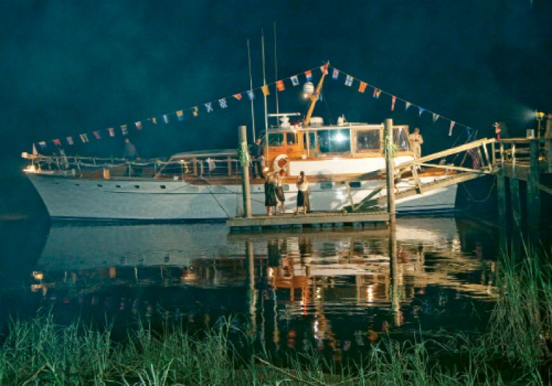 The couple’s getaway transport—a 1963 Trumpy yacht, the Blue Moon—doubled as their wedding night digs.