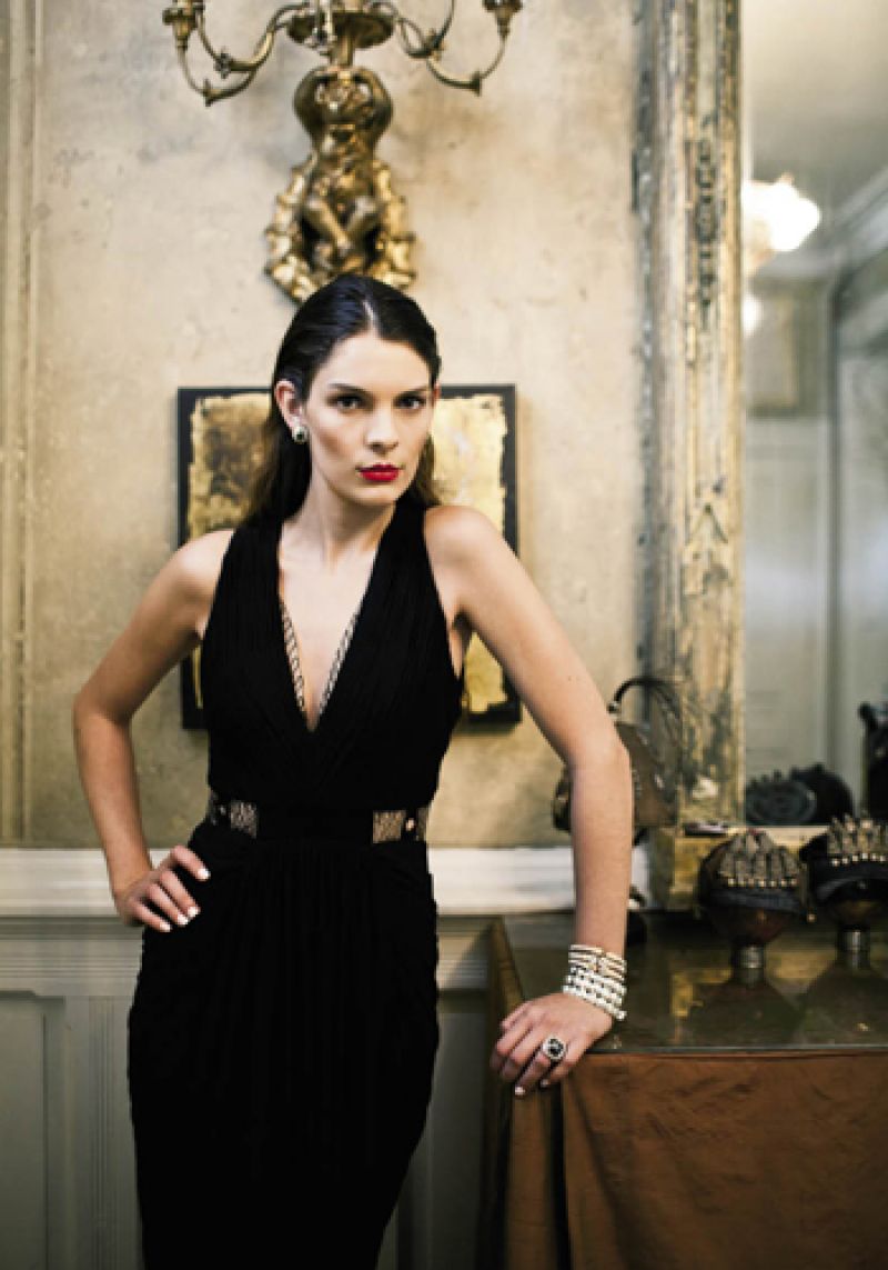 Jovani ruched liquid jersey dress with sheer embroidered tulle details, $625 at Berlin’s for Women; vintage emerald and diamond earrings, $5,800 at Joint Venture; David Yurman sterling silver and pavé diamond cushion chiclet bracelet, $3,700 at REEDS Jewelers; Alwand Vahan sterling silver, 14K gold, and diamond bracelets: $1,595, $1,460, and $1,425, all at Croghan’s Jewel Box; David Yurman Albion ring, sterling silver with faceted hematite and pavé diamonds, $1,600 at REEDS Jewelers.
