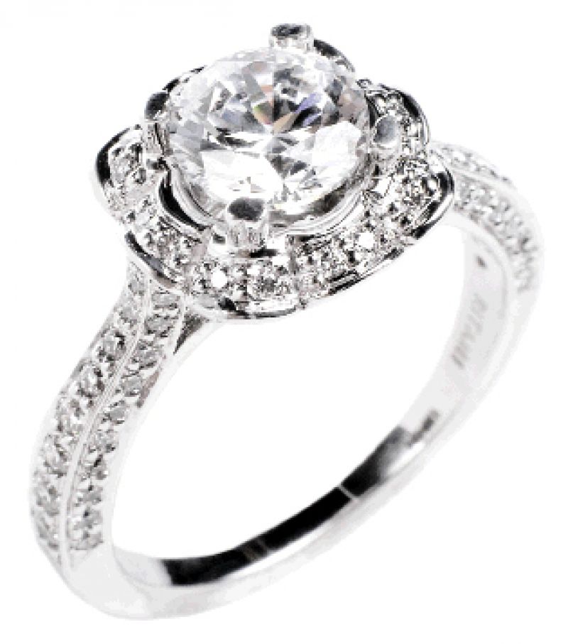 FLORABUNDANCE: 18K white gold ring with  accent diamonds (.46 total ct.) Paulo Geiss  Jewelers, $5,005  (setting only)
