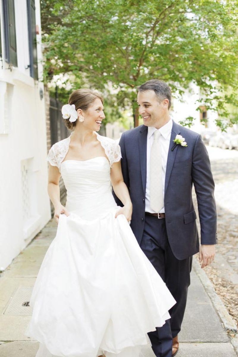 DRESSED &amp; IMPRESSED: The ivory tie of Tim’s J.Crew suit complemented Jessica’s Monique Lhuillier gown.