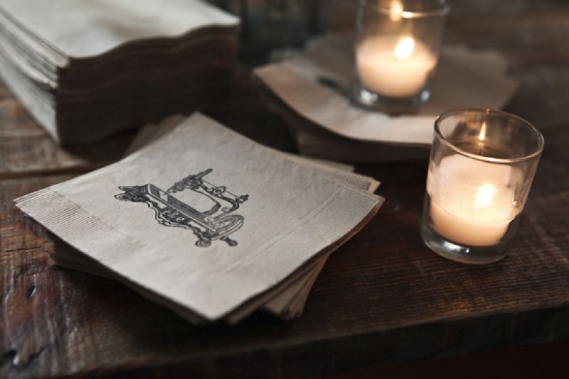 WIPED CLEAN: With help from friends, Elise stamped images of antique sewing machines and light bulbs on more than 500 cocktail napkins.