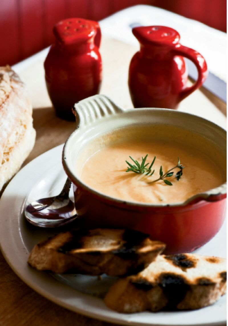 Leeks, carrots, and potatoes are blended with their cooking liquid, retaining their nutrients in the soupe de légumes.