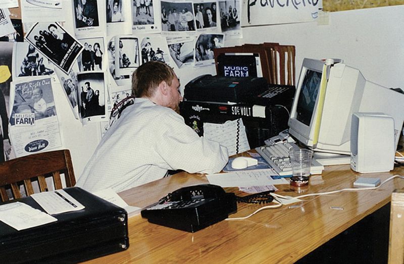 HIGH ENERGY: From 1991 to 1998, Music Farm co-founders Kevin Wadley (left) and Carter McMillan booked bands in the office by day and worked nightly shows until all hours.