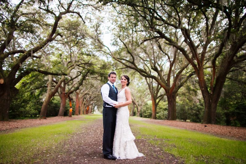Margaret and florist Whitney Randall limited the ceremony flowers to a handful of tastefully filled vases tied to aisle-side chairs.