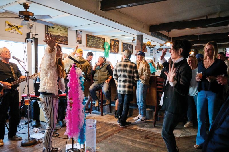 Inside, sunlight streams in while the Lynn Blue Band plays rock and soul hits for the crowd around the bar.