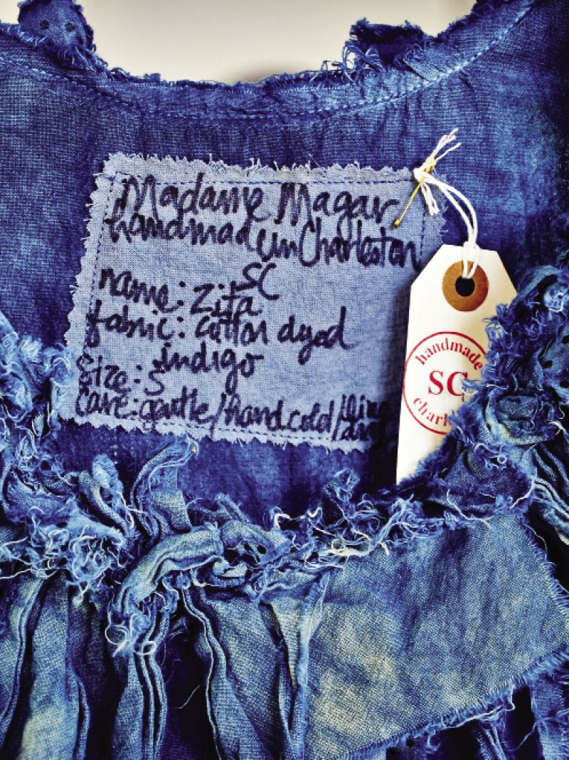 Blue is a favorite color of Magar’s, so she recently learned the South Carolina-born indigo-dyeing process and put it to use in the collection. As a nod to the friendly spirits she’s sensed in the historic building, she mixed a custom paint color she calls “Olympia Mill Haint Blue.”