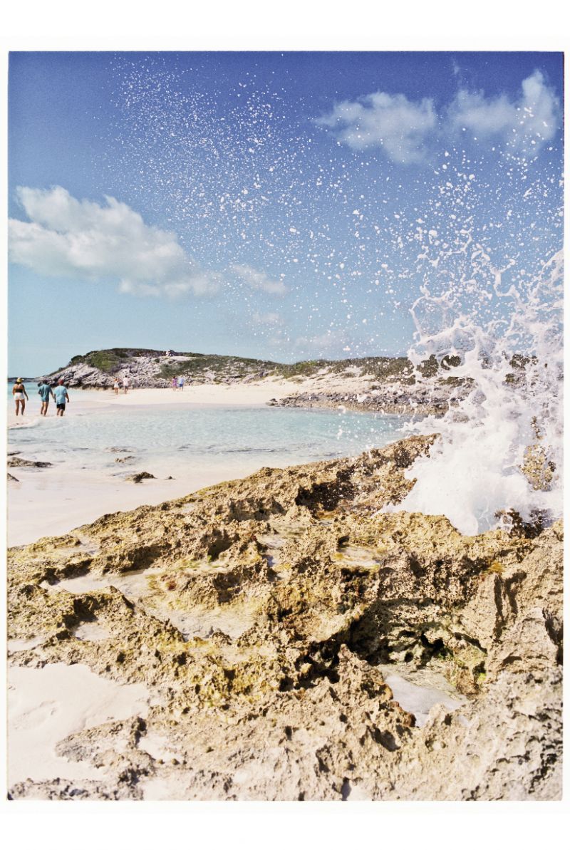 Sea spray whooshing from a coral formation near the Tropic of Cancer
