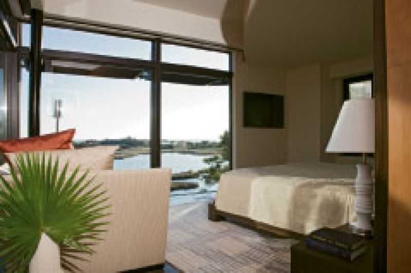 which were designed around a stately live oak (opposite