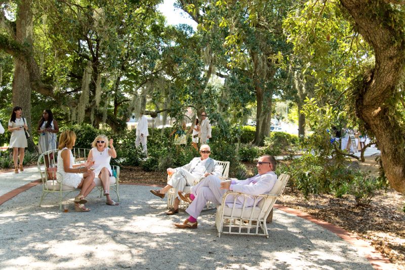 Benches and chairs were placed in the shade for guests to relax and mingle.
