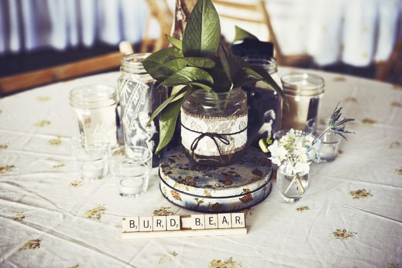 NAME GAME: Lisa and Seth’s table featured Scrabble tiles spelling out her nickname (Burd) and his favorite animal (bear). “It’s just us,” says Lisa.