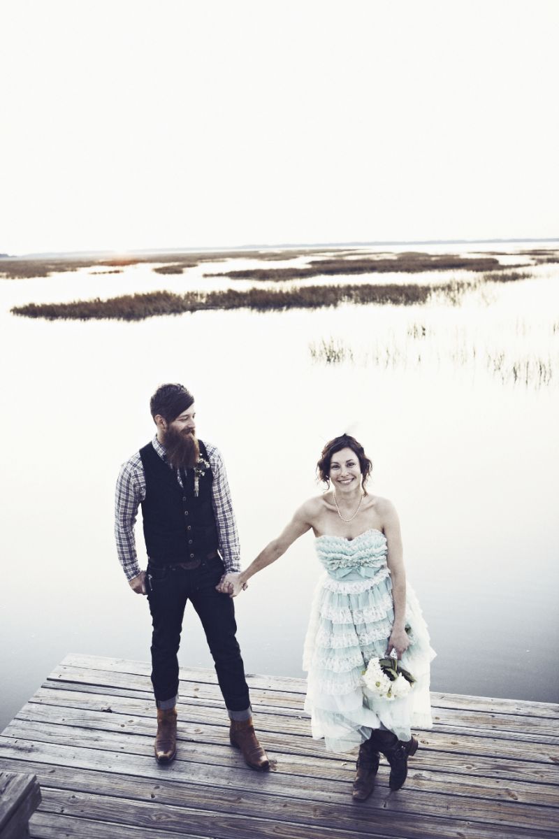 TWICE AS NICE: The couple, who wore boots and vintage garb, asked the bridesmaids to pick their own attire and the groomsmen to sport vests.