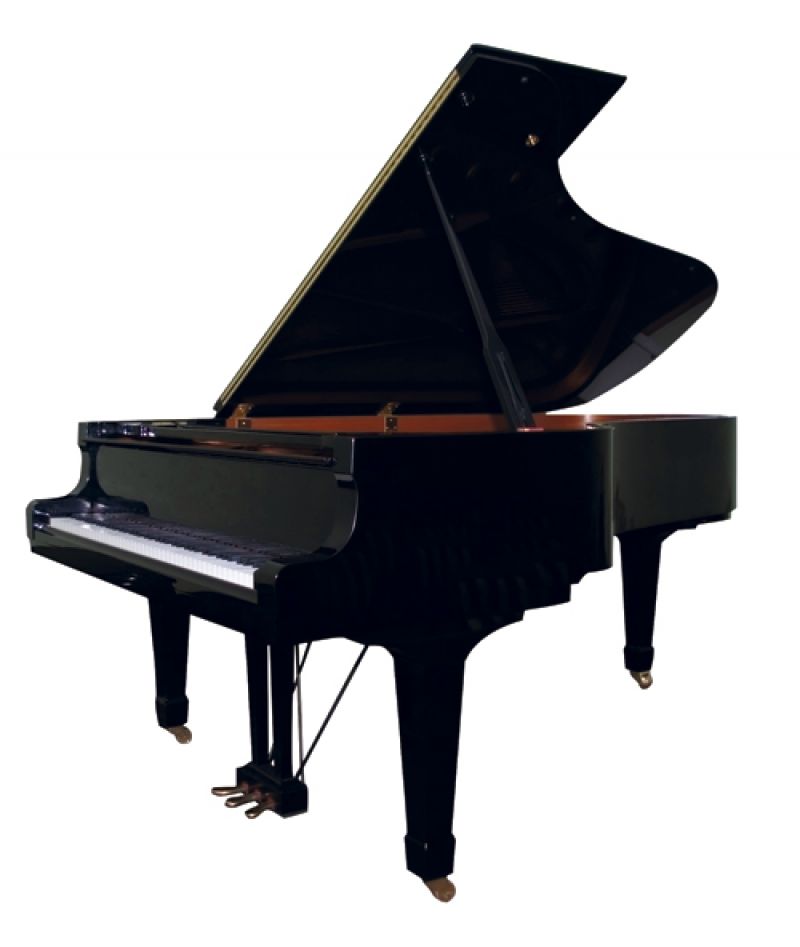 The chef bought this Yamaha player piano to entertain guests at In the Kitchen. Price upon request, Fox Music