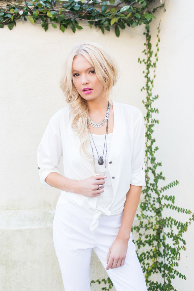 Lucy Love “Riley” sheer blouse, $49 at Willy Jays, Naked Zebra tank, $56 at II Brunettes; Elliot Lauren pants, $132 at Anne&#039;s; Goti dark metal necklace with bowl and chisel charm, $439, and Jensen Conroy sterling and brass necklace, $268, both at Worthwhile; Vinatge silver necklace, $60 at Filigree