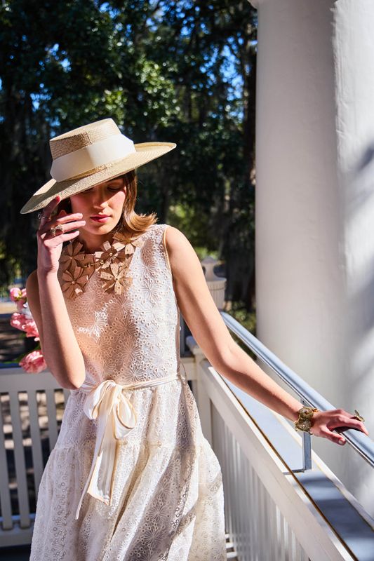 <strong>Mum’s the Word:</strong> Love Binetti eyelet midi dress, $475 at <a href="https://www.thefinickyfilly.com/" target="_blank">The Finicky Filly</a>; Legend of Geraldine “Gisele” two-tone blush and natural straw boater; $345 at <a href="https://www.legendofgeraldine.com/" target="_blank">legendofgeraldine.com</a>; Jahde “Floral Queen” collar in blush, $475 at <a href="https://jahdemade.com/collections/the-floral-collar/products/floral-collar?variant=39635905609831" target="_blank">Jahde Leather Atelier</a>; Gabriel + Co. rose tourmaline and diamond ring, $3,600 at <a href="https://pollysjewelry.com/" target="_blank">Polly’s Fine Jewelry</a>; Rebeka Hakimi gold and diamond band, $4,500 at <a href="https://diamondsdirect.com/" target="_blank">Diamonds Direct</a>; “Monarch” cocktail ring, $78, and “Gold Butterfly” adjustable cuff, $124, at <a href="https://www.jujuloves.com/products/gold-butterfly-cuff-bracelet" target="_blank">JuJuLoves.com</a>