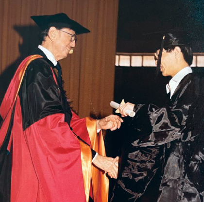 Hsu, receiving his doctoral degree