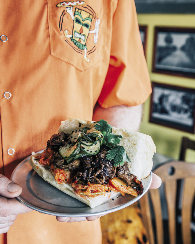 The Korean BBQ sandwich is piled high with Bulgogi-style beef with kimchee and quick-pickled cucumber.